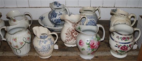 11 late Victorian toilet jugs (one a.f, one with matching bowl)